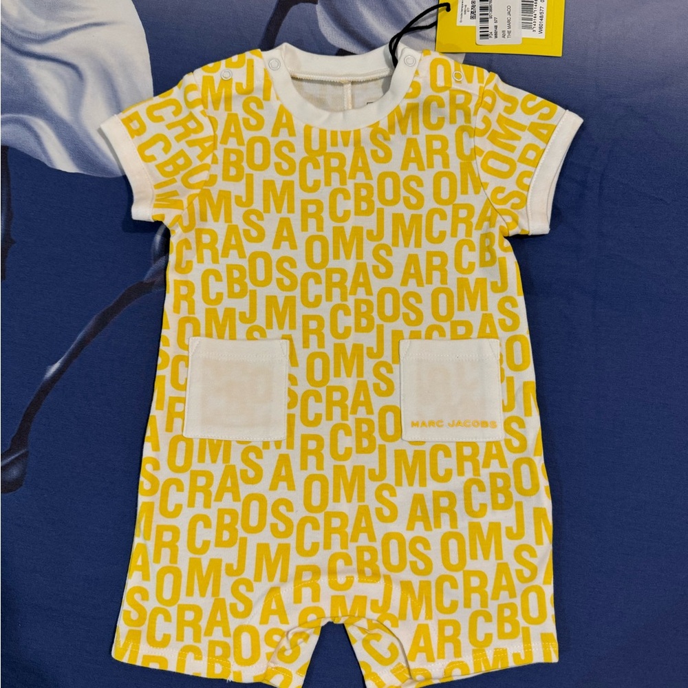 Brand new Marc Jacobs romper with tags. Baby size 3 month